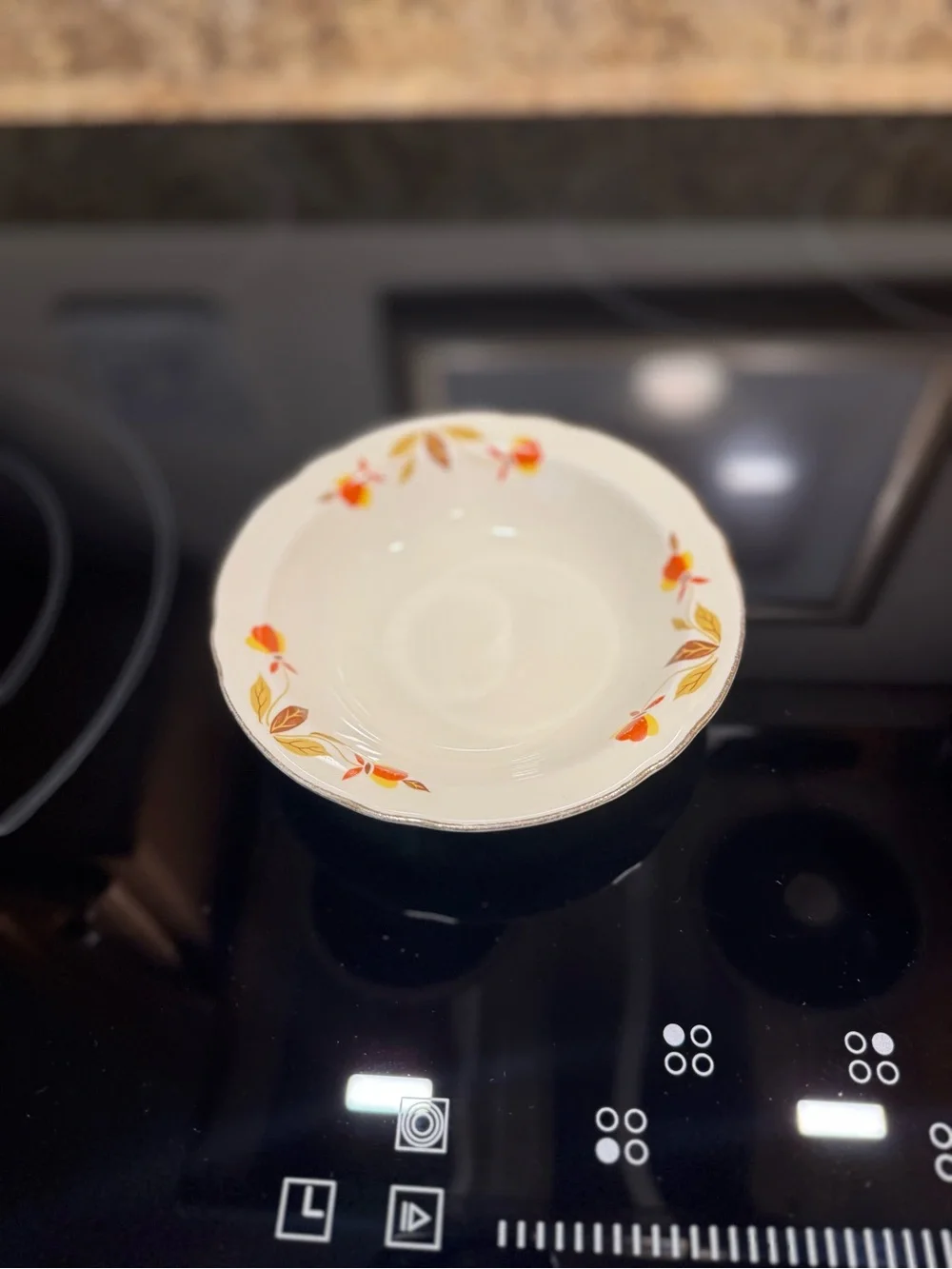 White Ceramic Serving Bowl with Orange Floral and Gold Leaf Accents